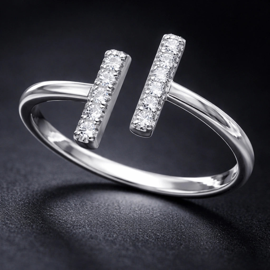 Silver ring with diamond accents on a dark background