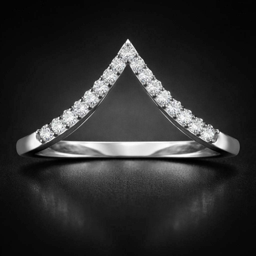 Diamond-studded triangular ring on a black background