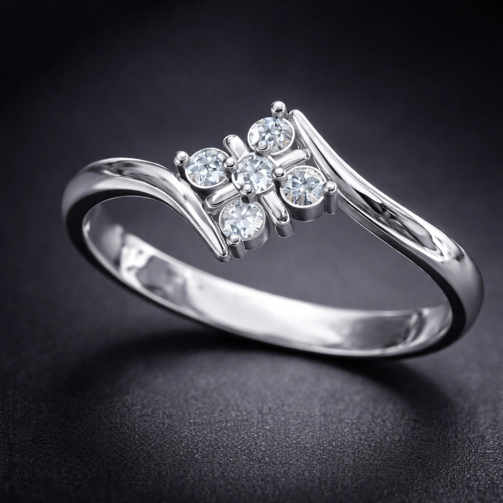 Silver ring with diamond-like stones on a dark background