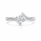 Silver ring with diamond accents on a white background