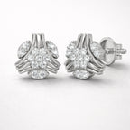 Pair of silver earrings with diamond-like stones on a white background