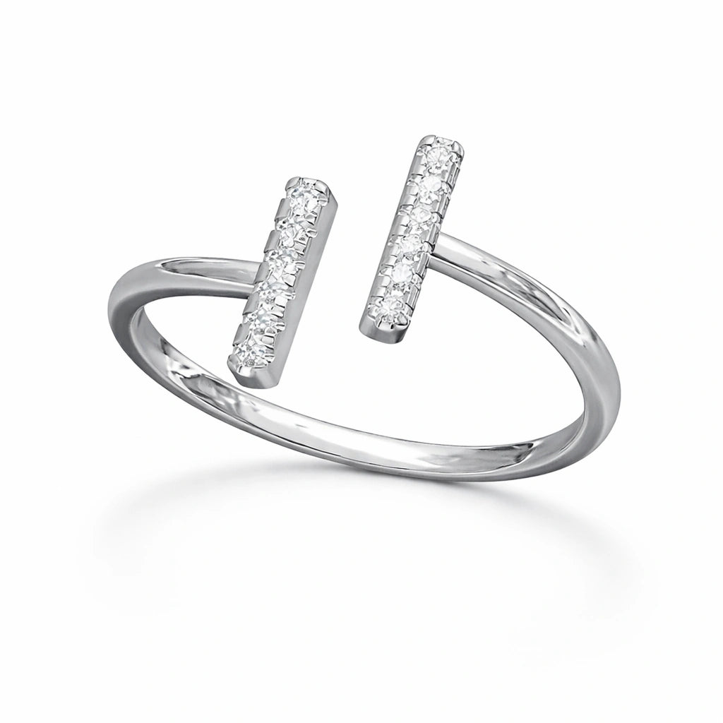 Silver ring with two vertical diamond-studded bars on a white background