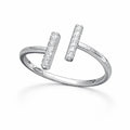 Silver ring with two vertical diamond-studded bars on a white background
