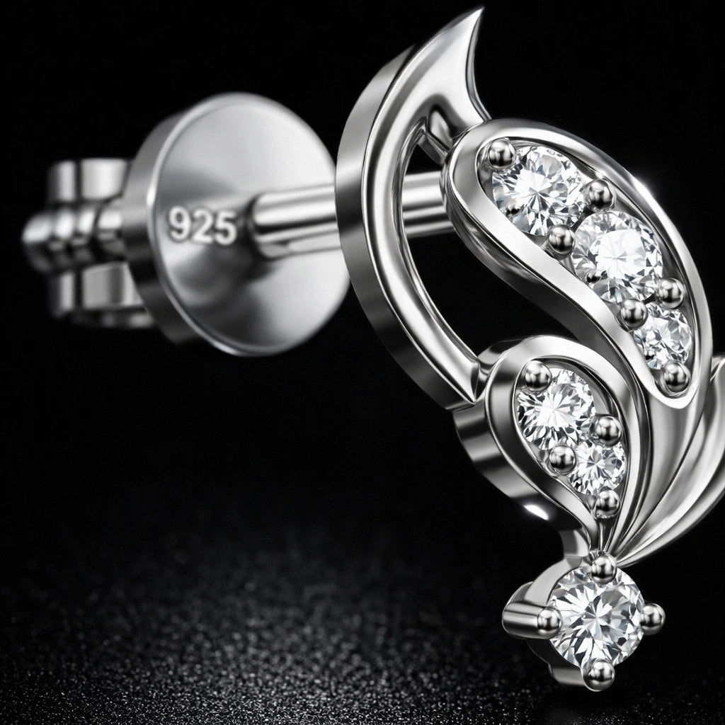 Silver earring with gemstones on a black background