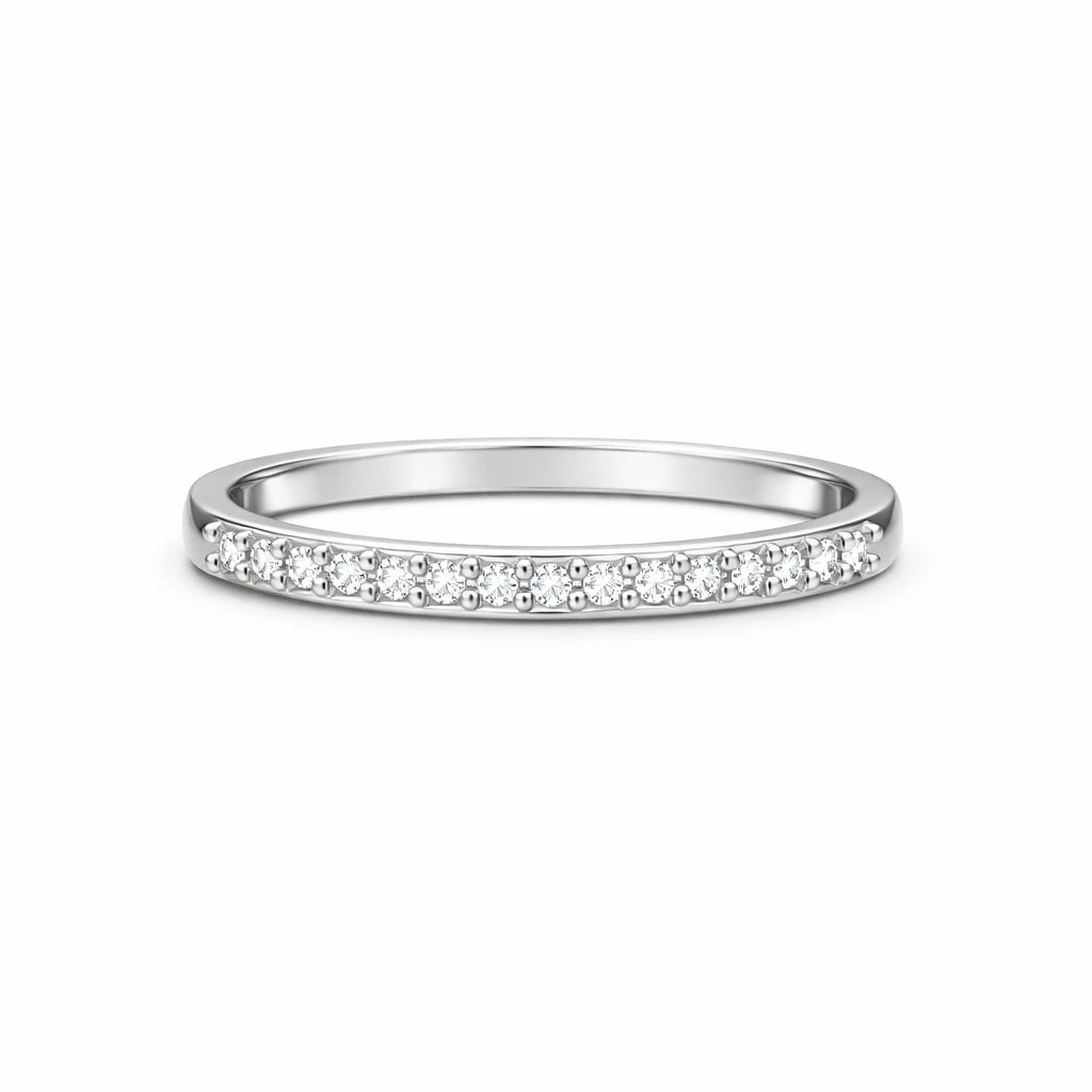 Silver ring with small diamonds on a white background
