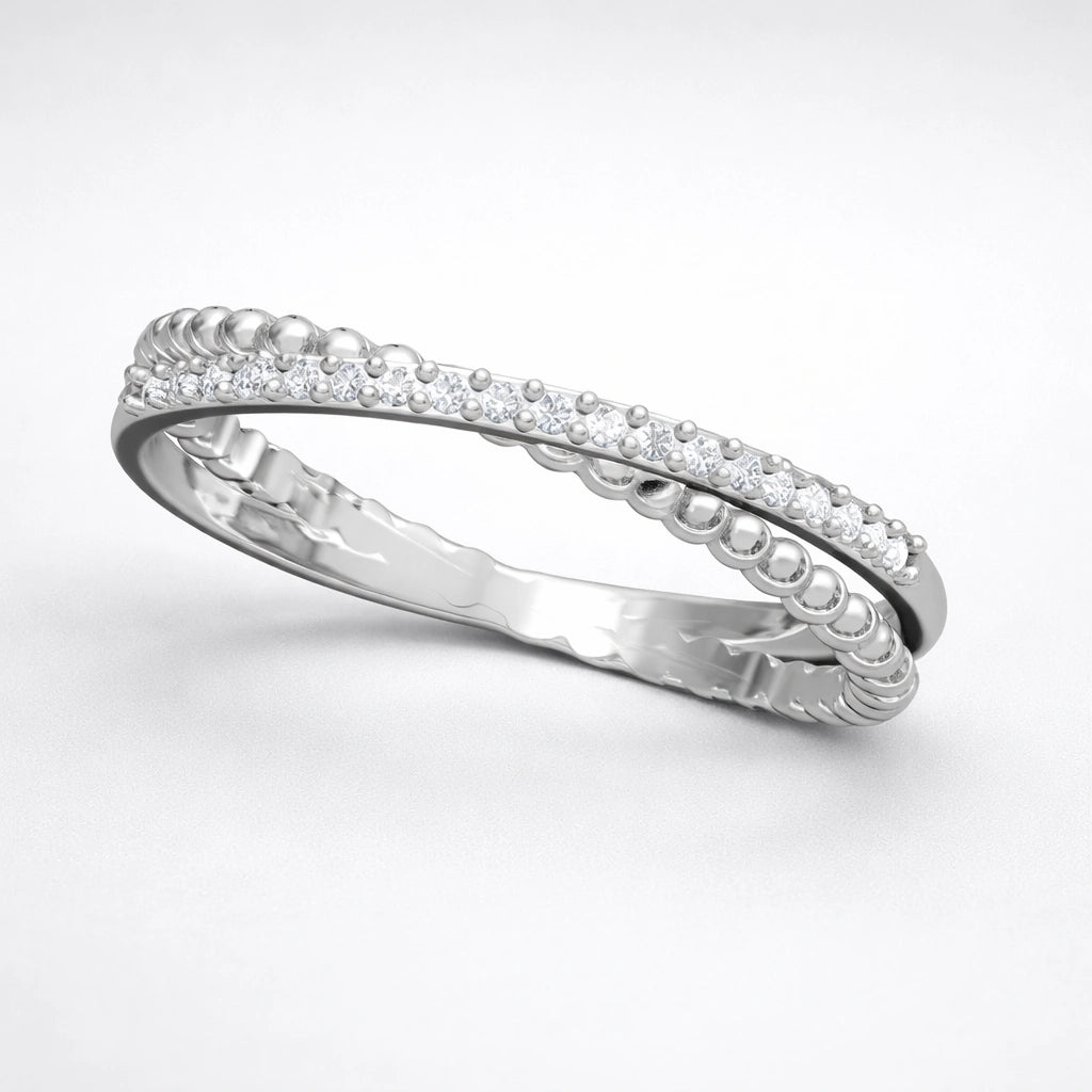 Silver ring with small diamonds on a white background