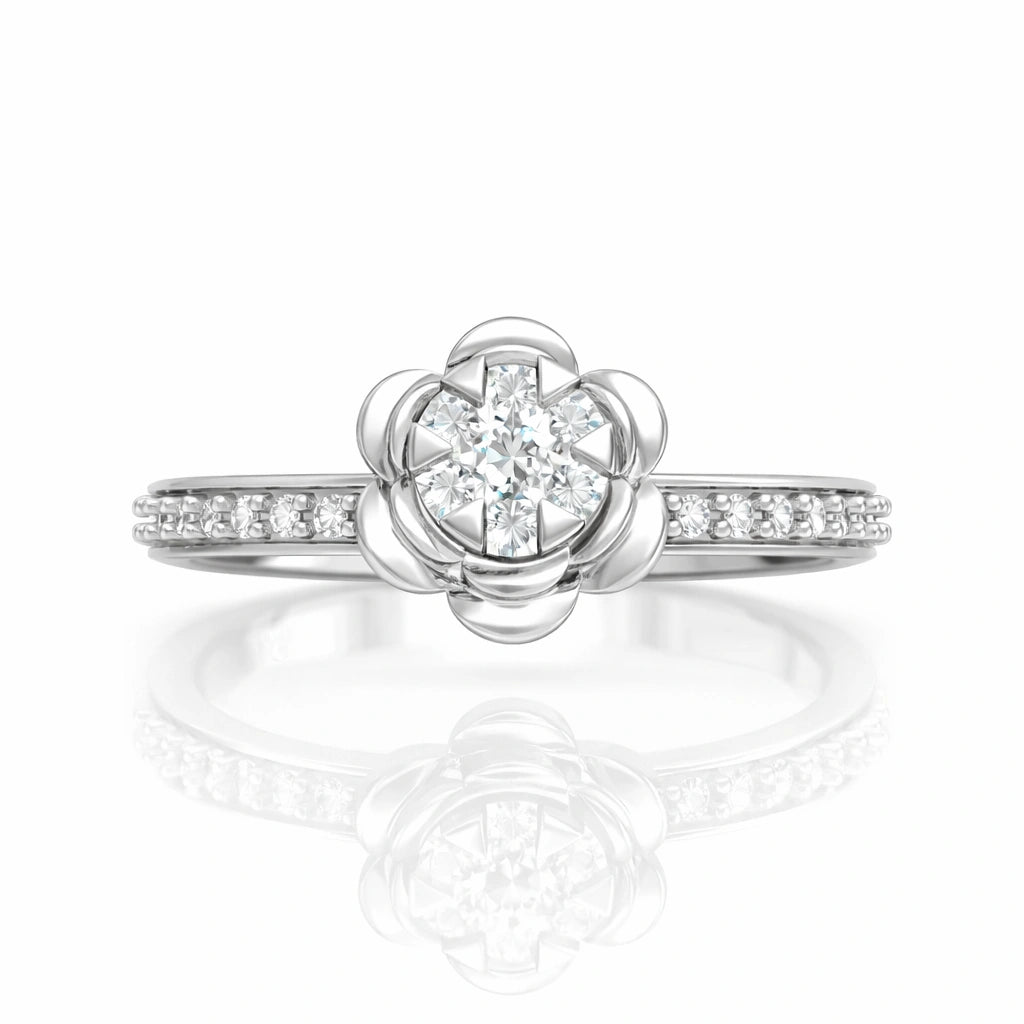 Silver ring with diamond flower design on a white background