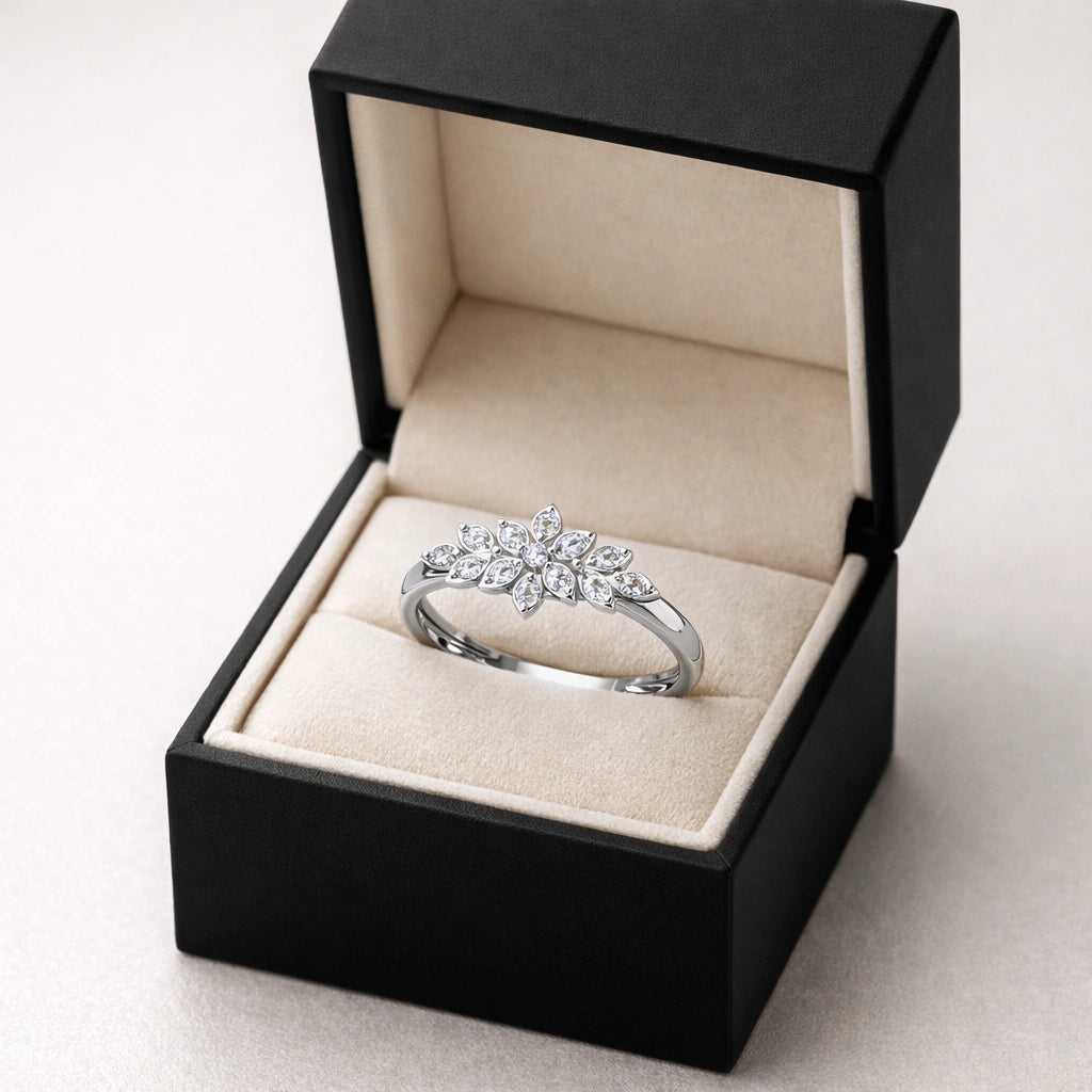 Diamond ring in a black box on a light background