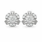 Pair of silver earrings with diamond-like stones on a white background