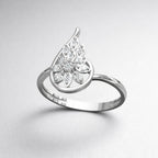 Silver ring with diamond accents on a light gray background