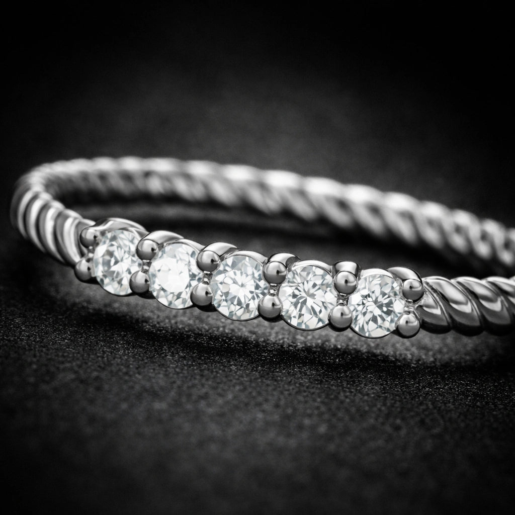 Silver bracelet with diamonds on a dark background
