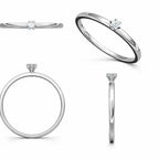 Set of silver rings with diamonds on a white background