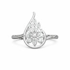 Silver ring with a floral design on a white background