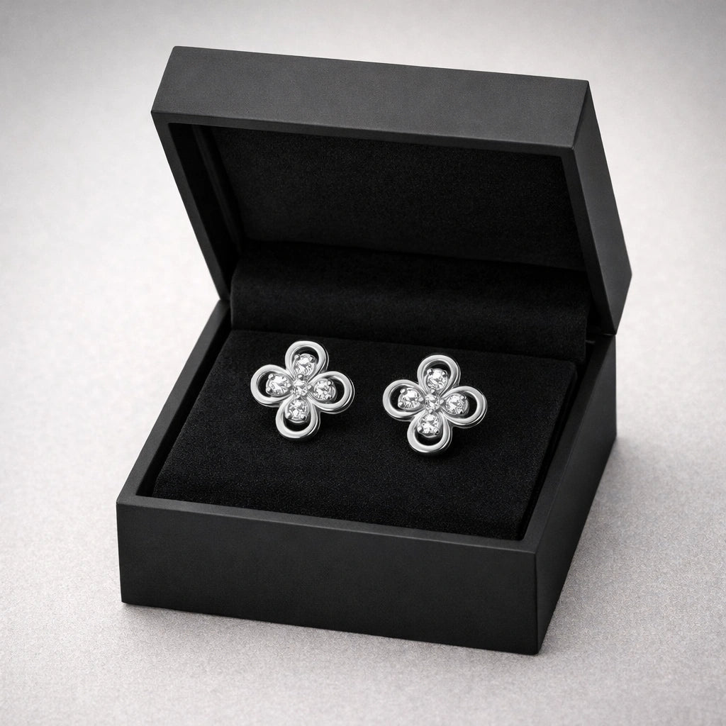 Floral diamond stud earrings displayed in luxury black jewelry box for gifting