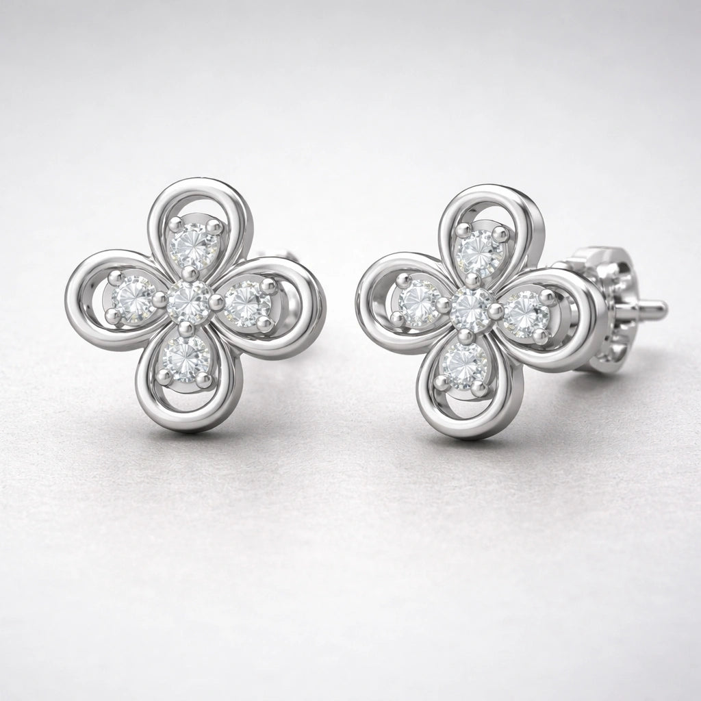 Floral diamond stud earrings worn on ear showing elegant size and everyday wear look