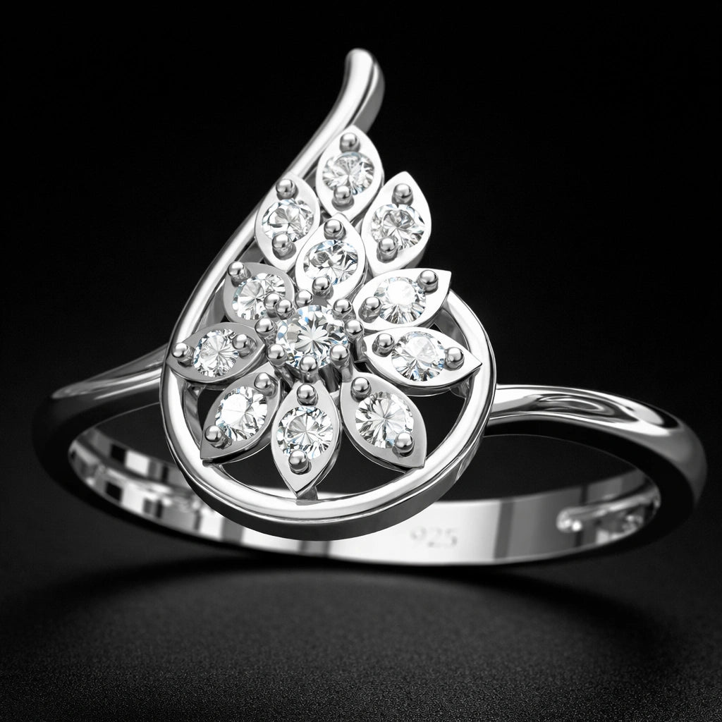 Silver ring with diamond leaf design on a black background