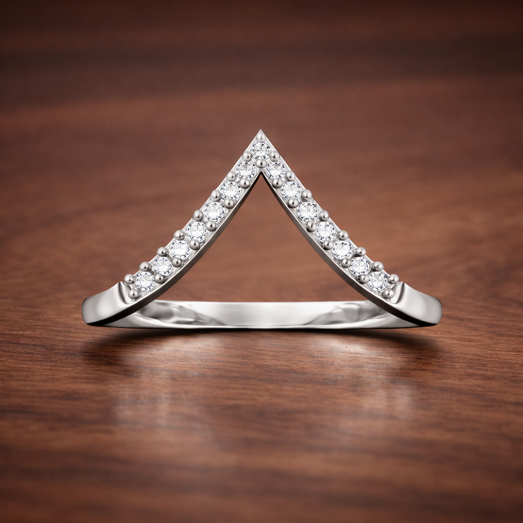 Diamond triangle ring on a wooden surface